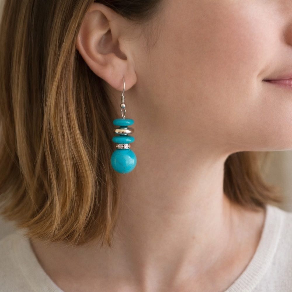 Turquoise & silver dangling earrings, in good condition, approximately 2”